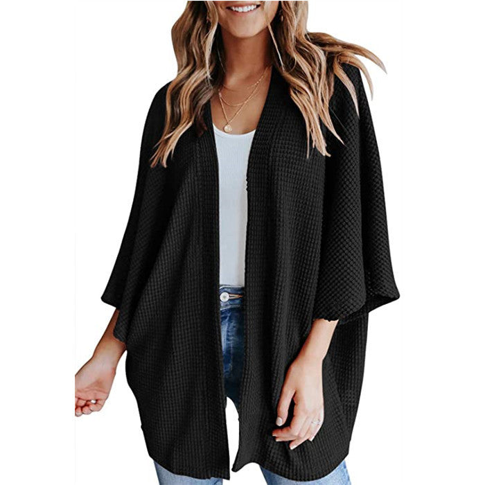 Ladies casual knit kimono with a loose fit and chic casual design