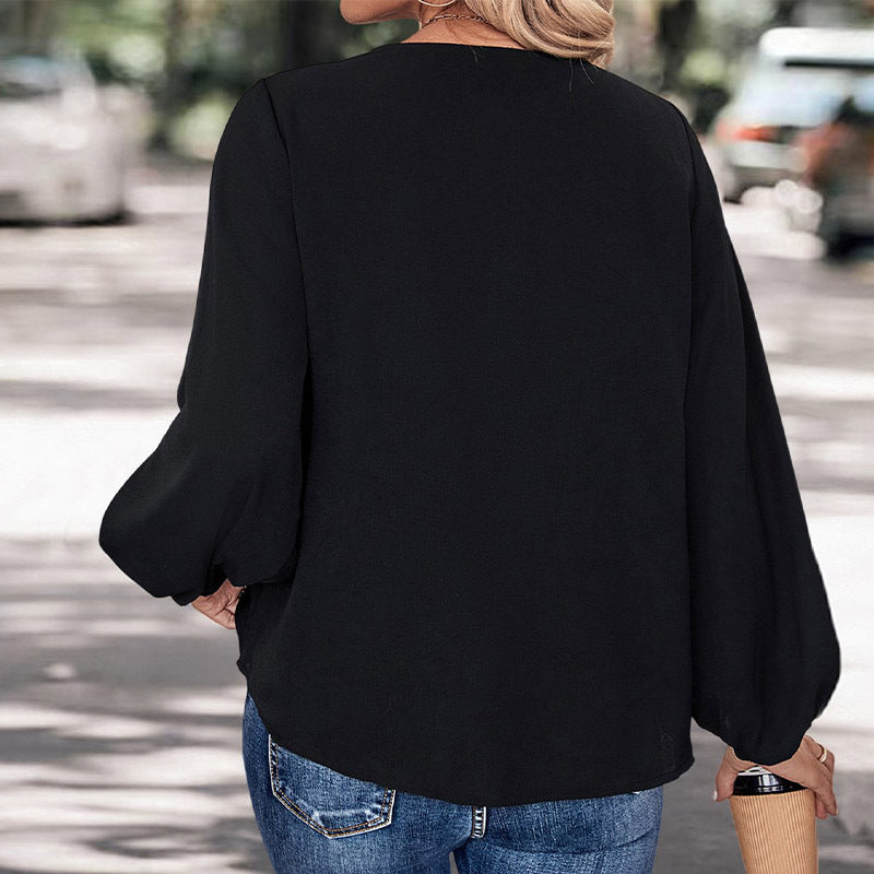 Casual blouse for women with elegant V-neck and stylish animal pattern Lune London