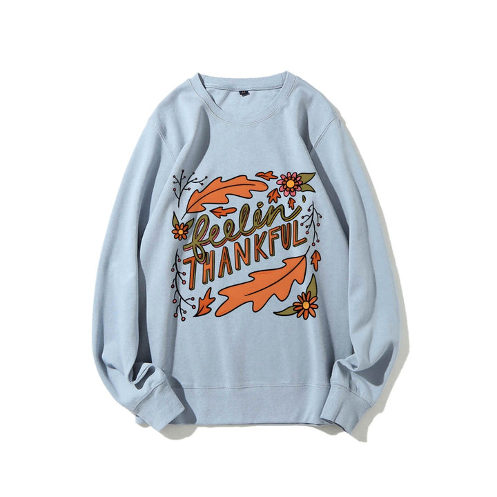 Sweat-shirt femme avec motif automnal coloré et lettrage inspirant Chic & Stil