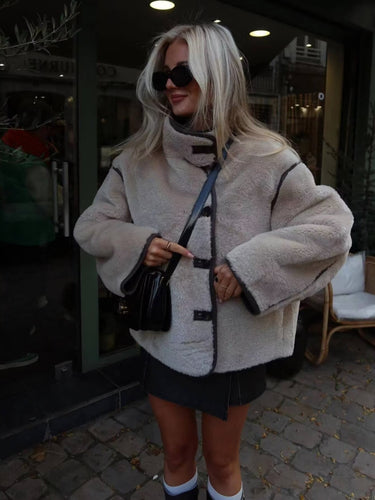 Faux fur jacket for women with a stylish high collar and practical pockets Lune London
