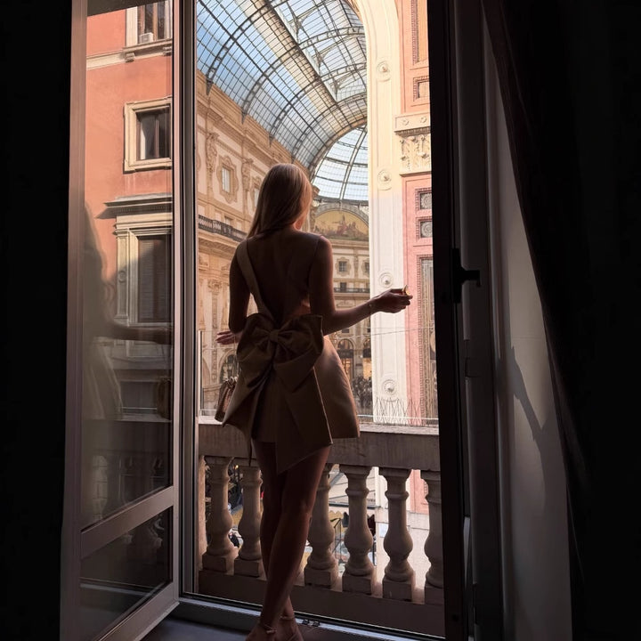 Elegant cocktail dress for ladies with a modern cut and a flared skirt Lune London