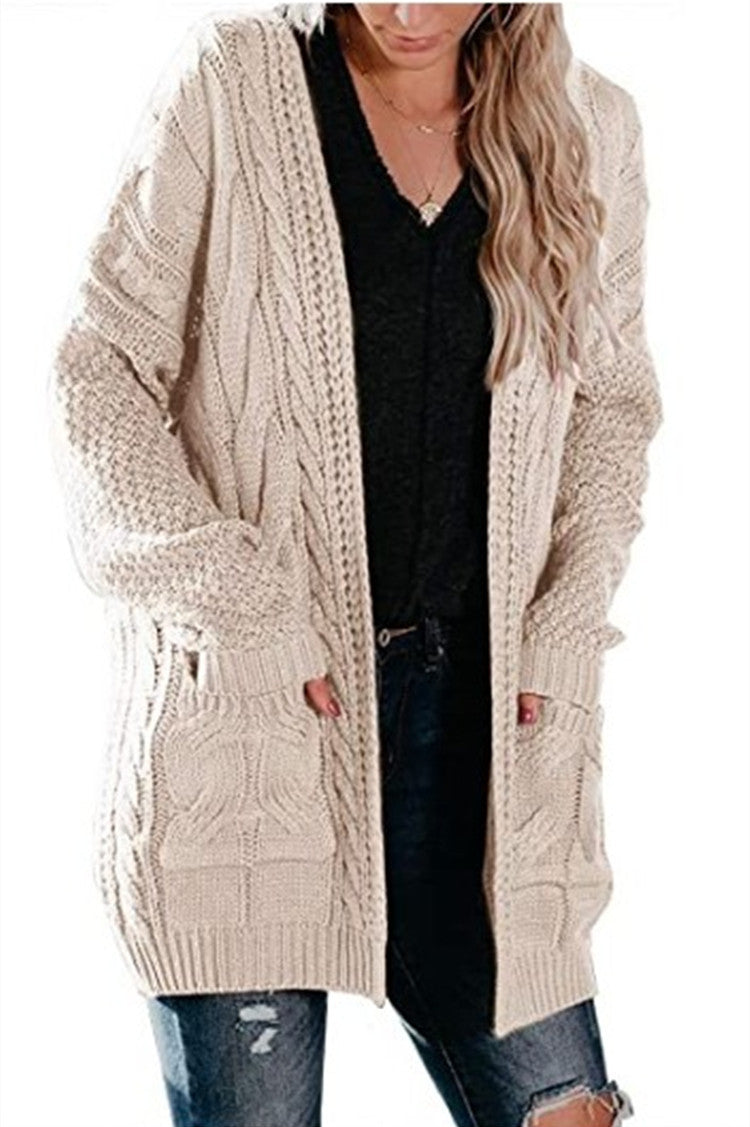Thick knit jacket for women with deep pockets and textured cable pattern Lune London