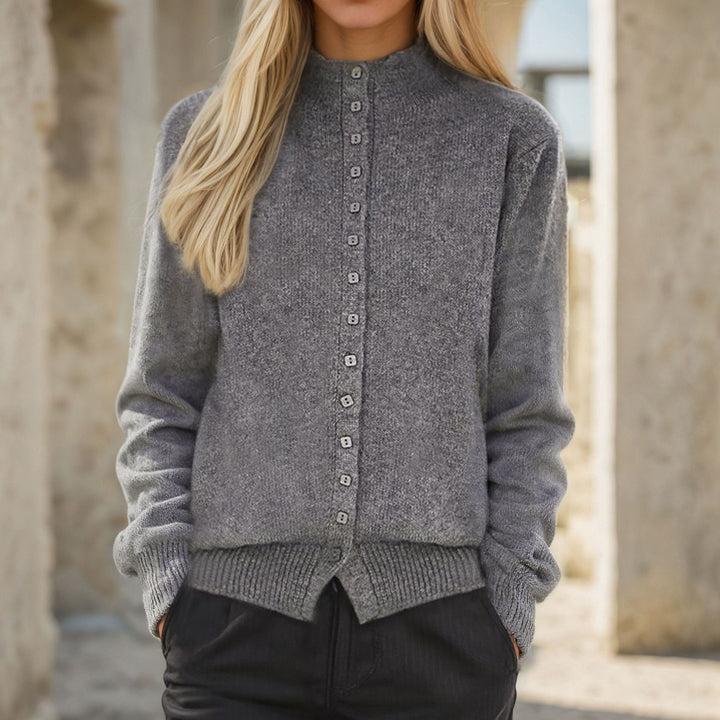 Knitted jacket for women with decorative buttons and a high collar Lune London