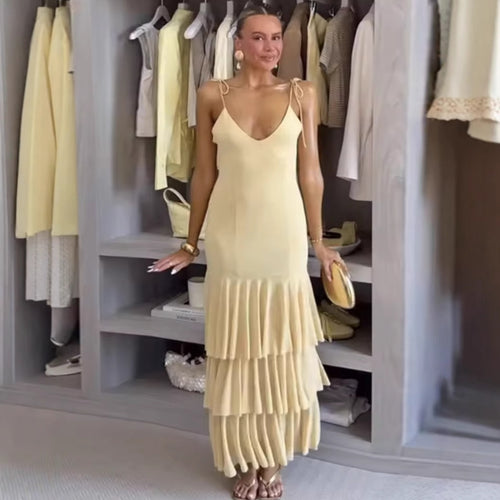 Maxi dress for women with voluminous ruffle details and adjustable spaghetti straps Lune London