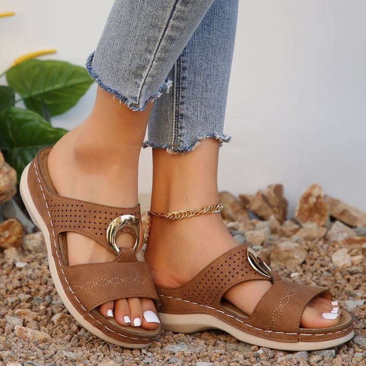 Women Sabot with perforations and decorative buckle Lune London