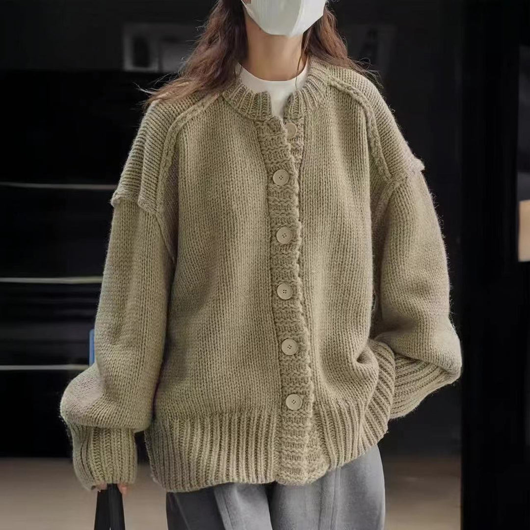 Oversized knitted jacket for women with special button details and wide sleeves Lune London