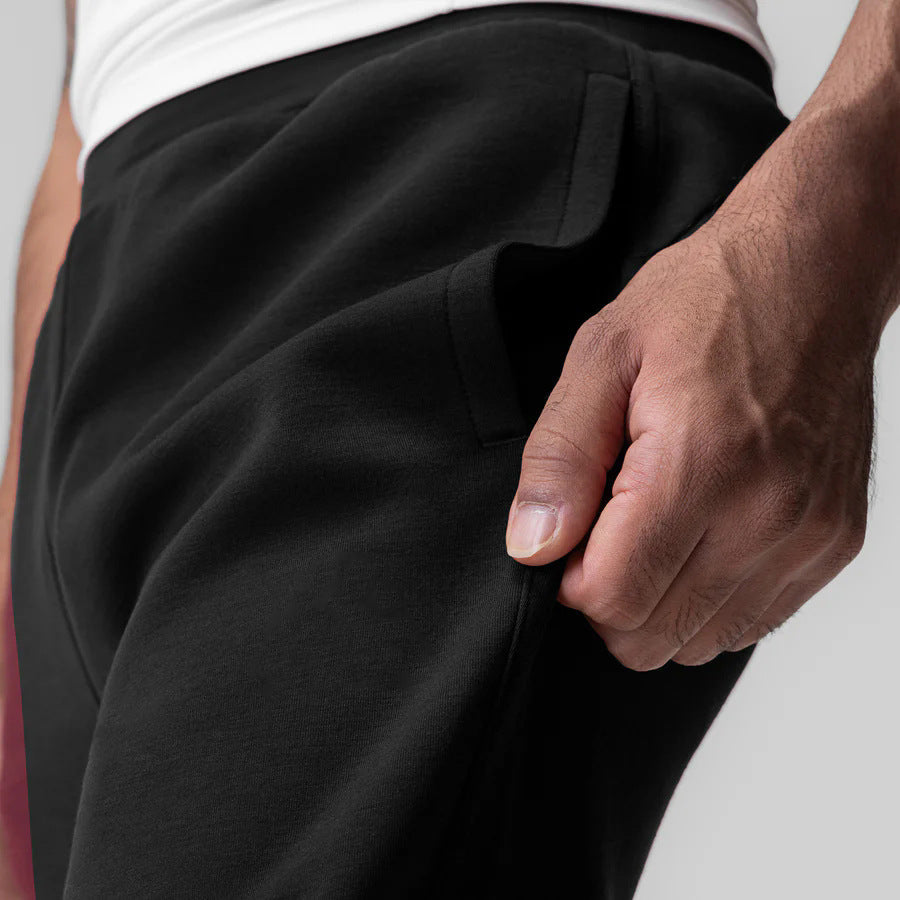 Sporty men's jogger pants with modern cut and practical pockets Lune London