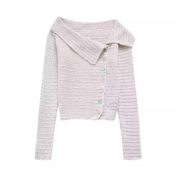 Elegant women's knitted vest with a deep collar and chic button details and style