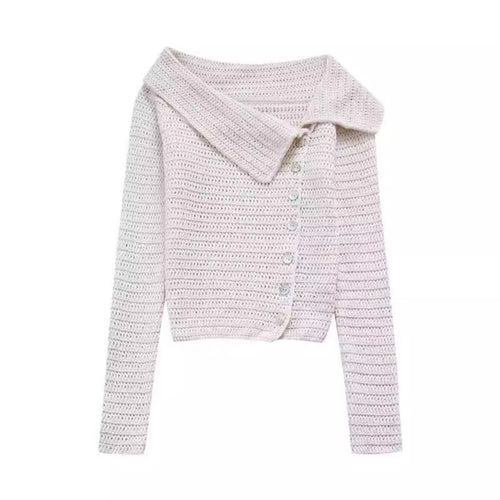 Elegant women's knitted vest with a deep collar and chic button details and style