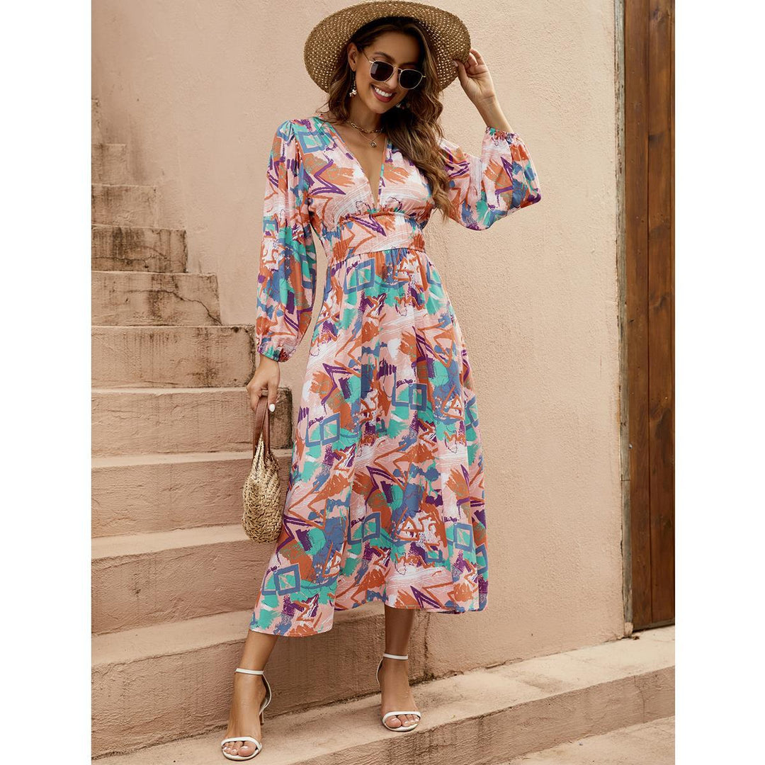 Elegant maxi dress for ladies with deep V-neck and voluminous sleeves Lune London