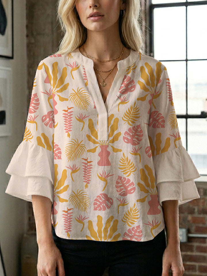 Women's blouse with ruffle details and eye-catching animal print Lune London