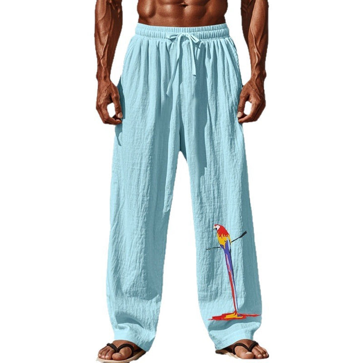 Casual beach pants for men with elastic waistband and colorful bird pattern Lune London