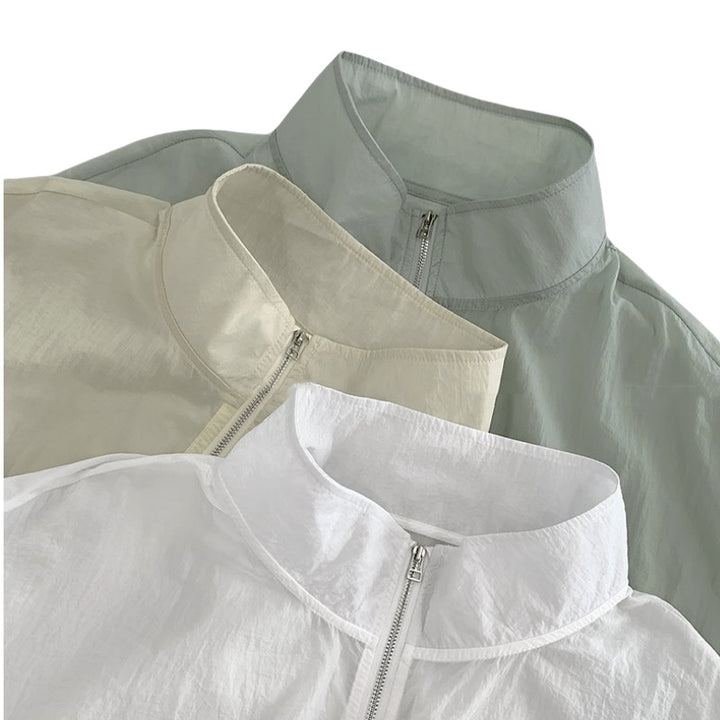 Veste coupe-vent légère pour femmes avec fermeture éclair pratique et poche kangourou Chic & Stil