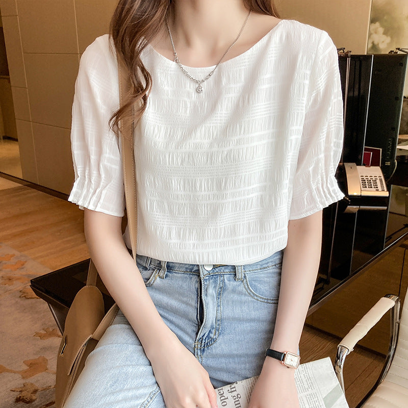 Haut féminin à la mode avec un design texturé léger et une coupe aérienne Chic & Stil