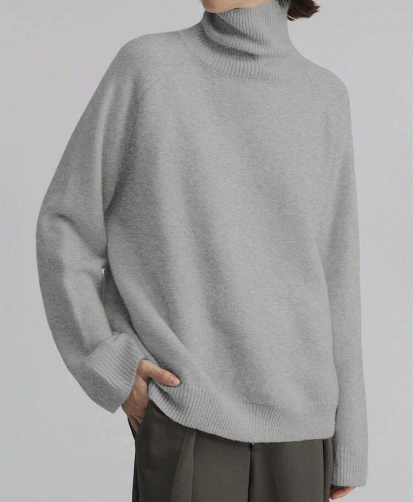 Women's oversized turtleneck sweater with fine texture Chic and Style