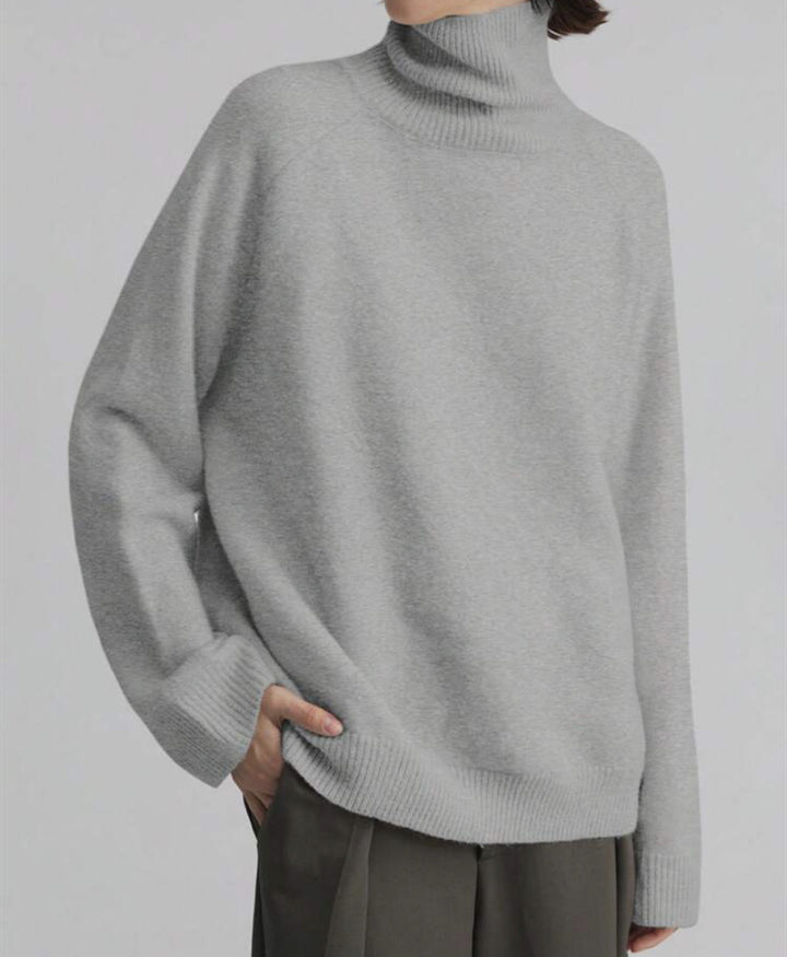 Women's oversized turtleneck sweater with fine texture Chic and Style