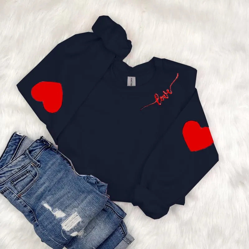Sweatshirt femme avec design cœur et coupe décontractée Chic & Stil