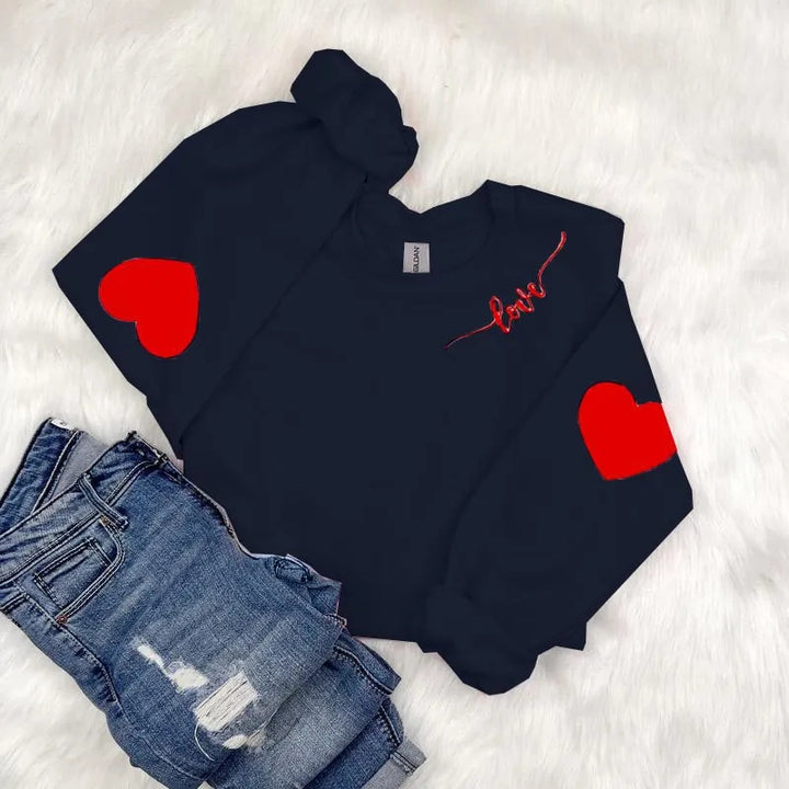 Sweatshirt femme avec design cœur et coupe décontractée Chic & Stil