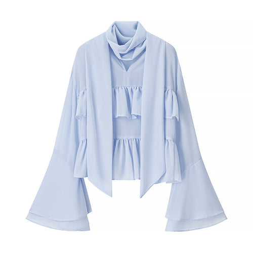Women elegant blouse with voluminous ruffles and asymmetrical cut Lune London