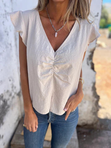 Women’s ruffled blouse with short sleeves and pleated detail Lune London