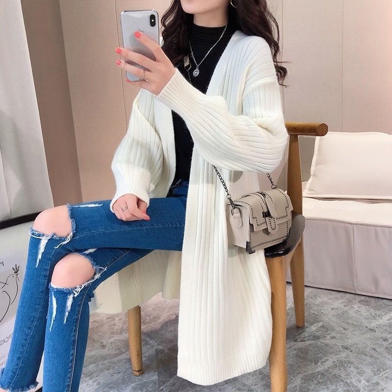 Striped chunky knit cardigan for women with an open cut and long sleeves Lune London