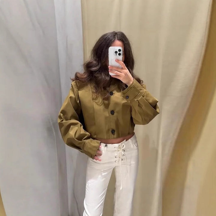 Fitted feminine blouse with continuous button details Lune London