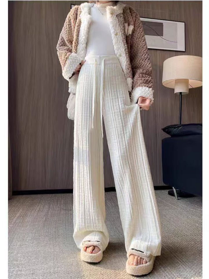 Loose linen pants for women with elastic waistband and striped design Lune London