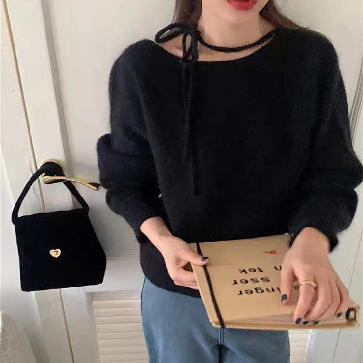 Pull décontracté pour femmes avec col décoratif et matériau doux Chic & Stil