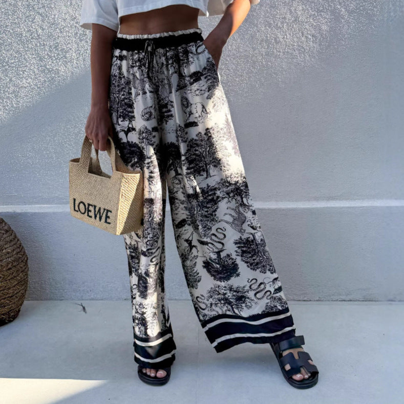 Wide palazzo pants for Damen with floral pattern and elastic waistband Lune London