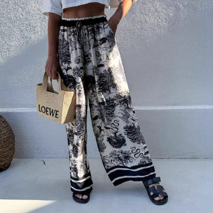 Wide palazzo pants for Damen with floral pattern and elastic waistband Lune London