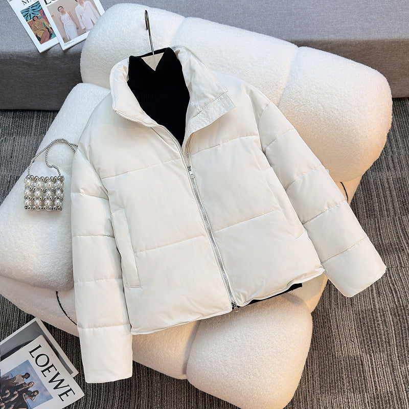 Short quilted jacket for women with high collar and practical piped pockets Lune London