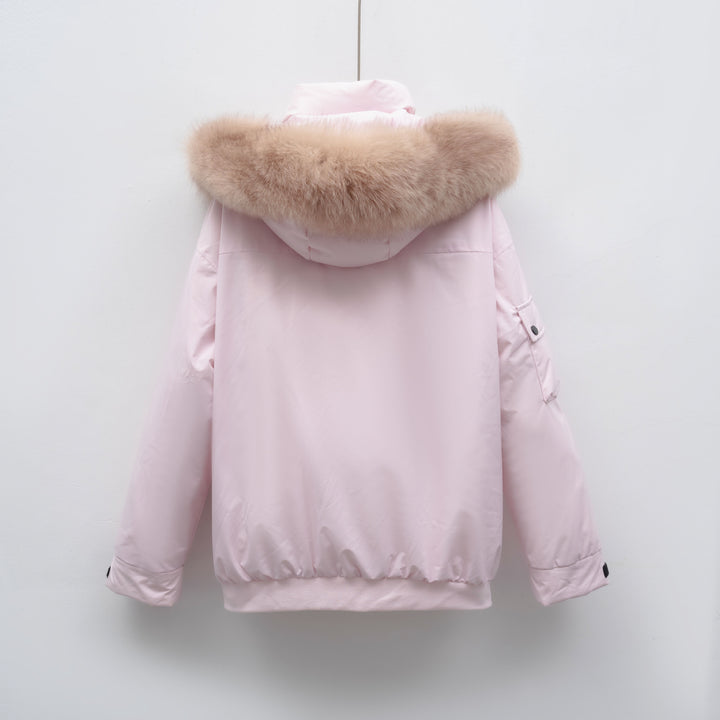 Winter coat for women with bulky faux fur collar and functional pockets Lune London