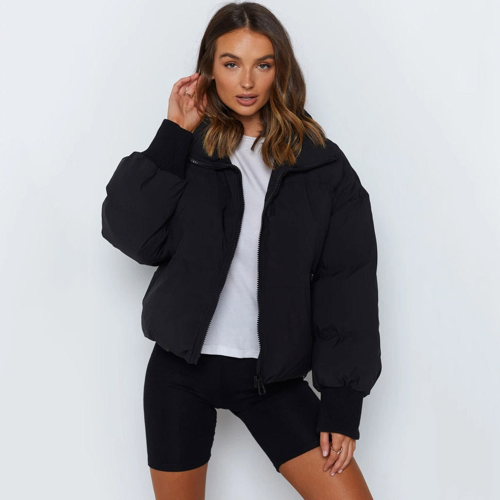 Women's casual quilted jacket with hood and elastic cuffs Chic & Stil