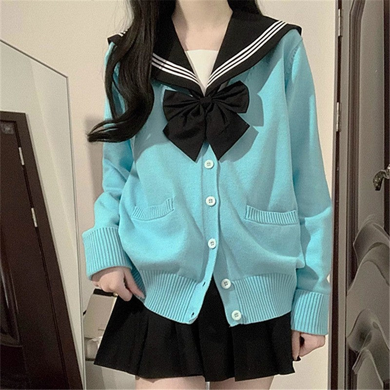 Cardigan féminin ludique avec grand col et détail de nœud Chic & Stil