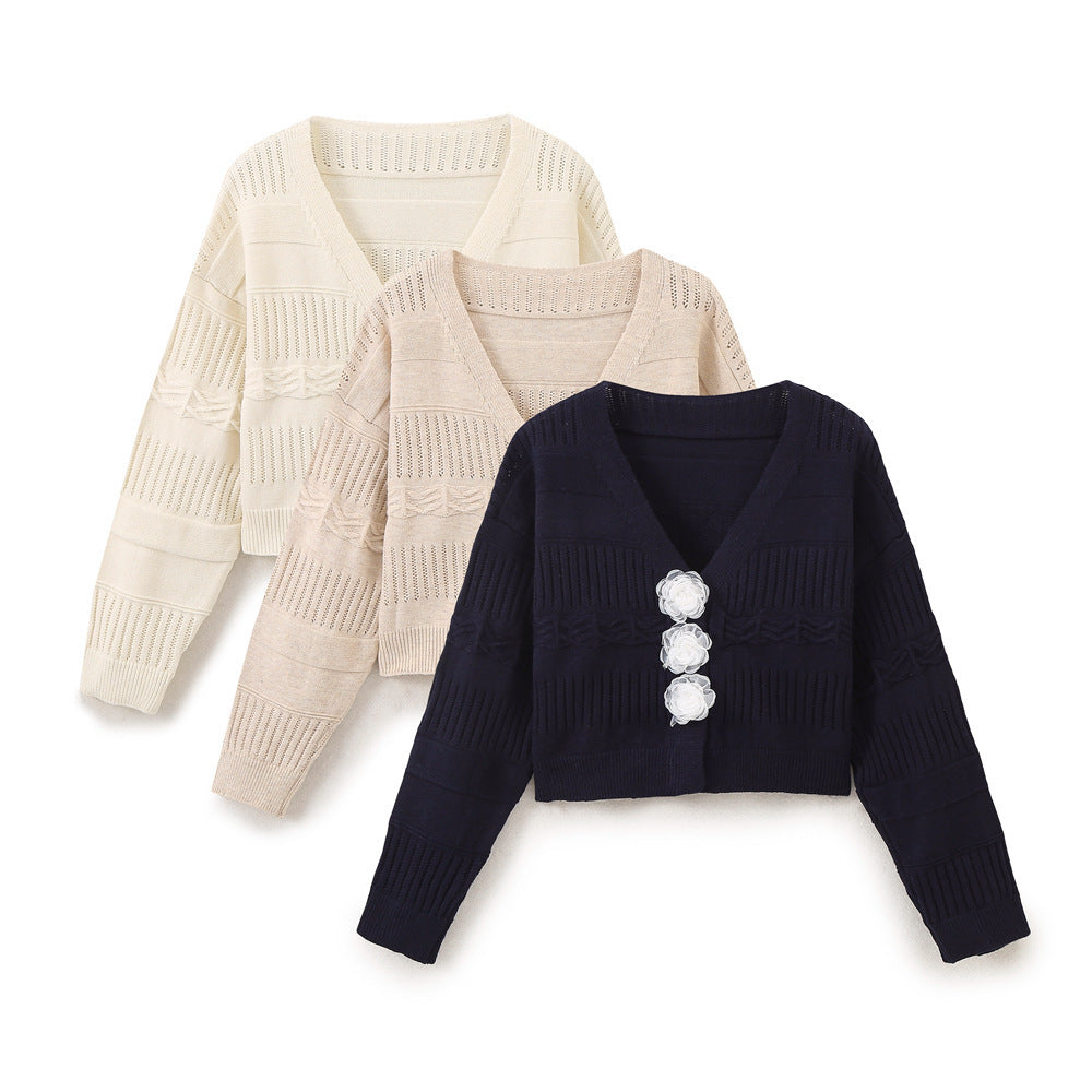 Ladies fashion sweater with romantic floral buttons and casual cut Lune London