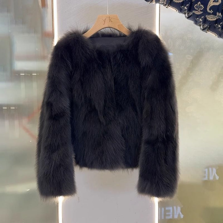 Veste élégante en fausse fourrure pour femmes avec coupe courte Chic & Stil