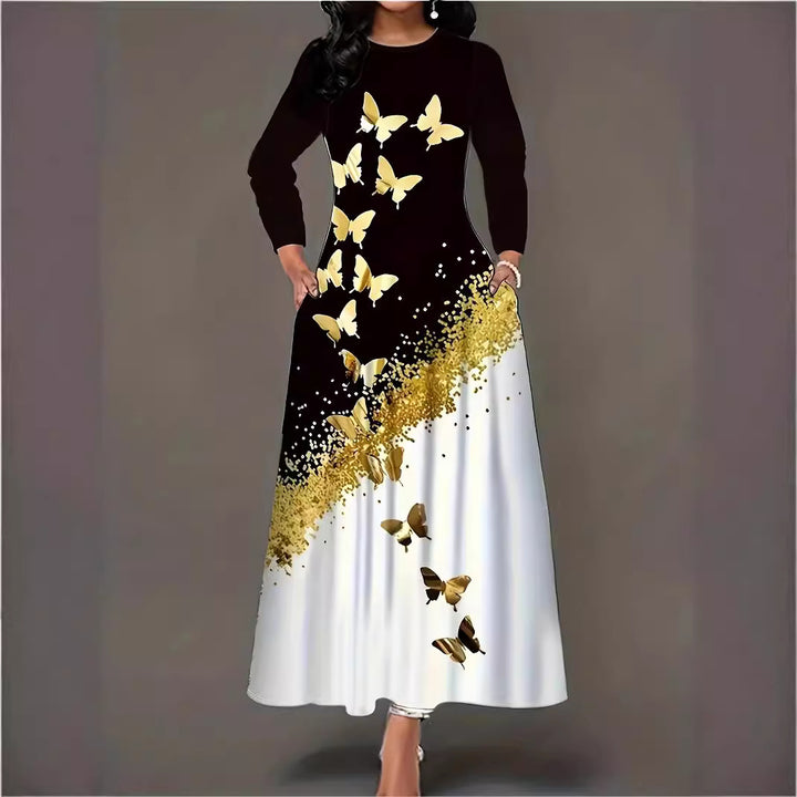 Maxi dress for women with an elegant butterfly pattern and a sparkling gold accent Lune London