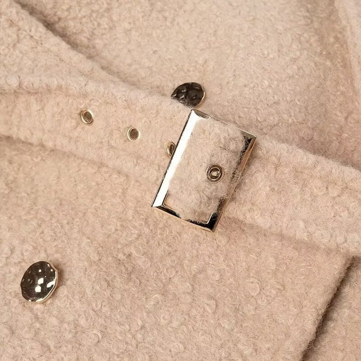 Manteau matelassé élégant pour femmes avec ceinture et col stylé Chic & Stil