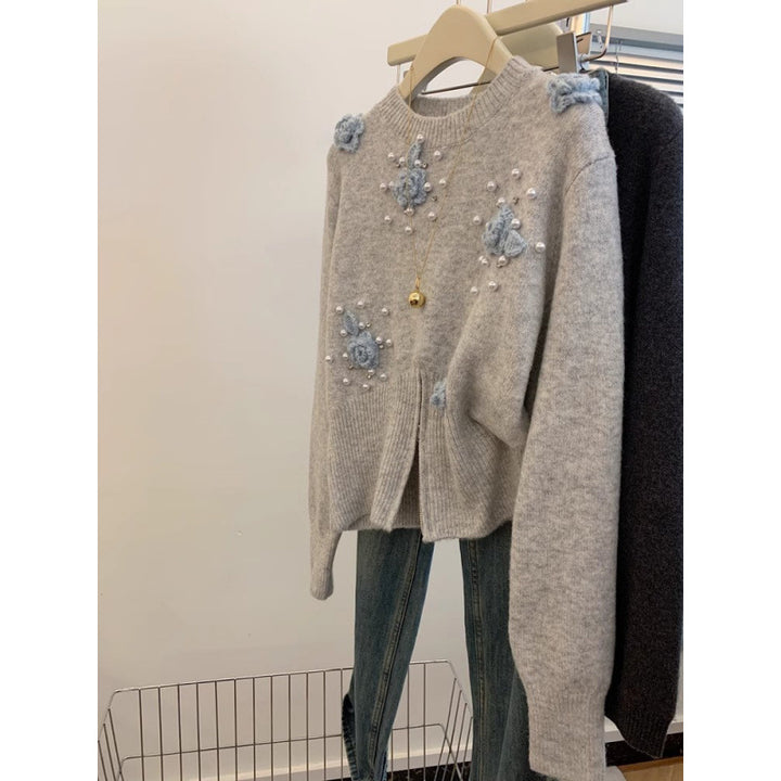 Sweater stylé pour femmes avec des applications florales Chic & Stil