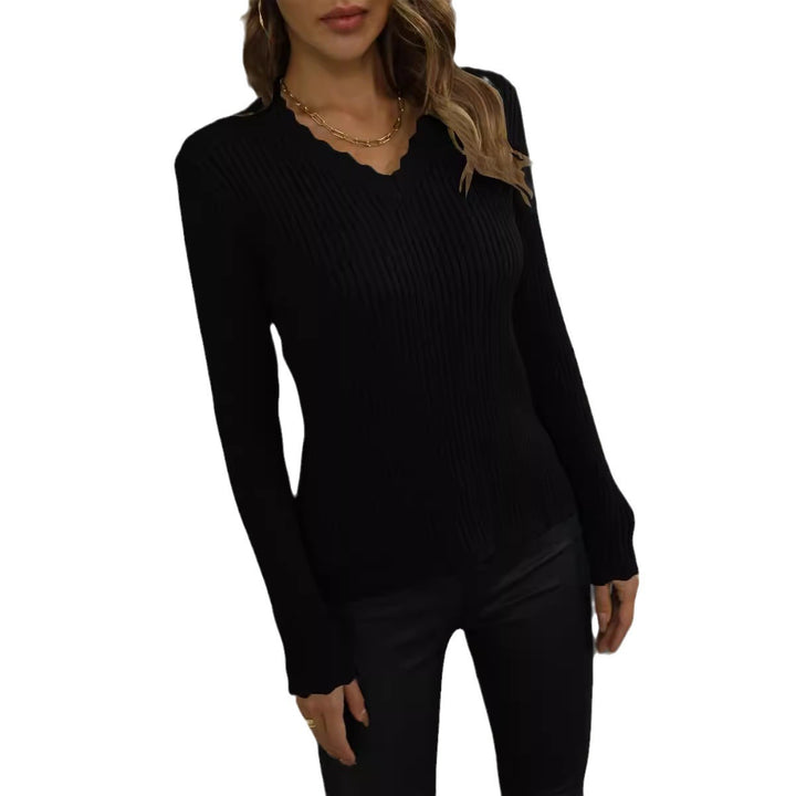 Pull en rib avec col en V pour femmes et bord ondulé Chic & Stil