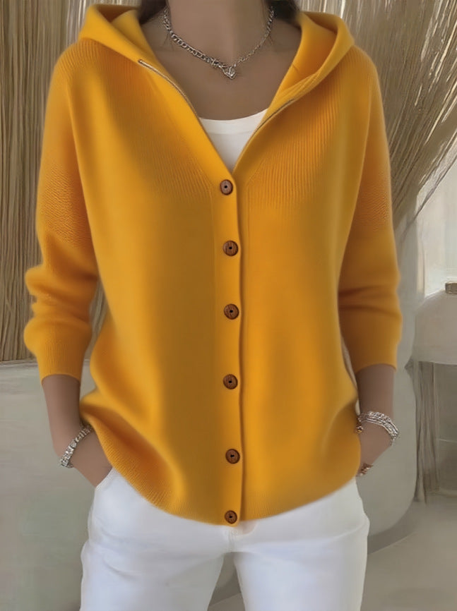 Knitted hooded jacket for ladies with practical button details and a relaxed fit Lune London