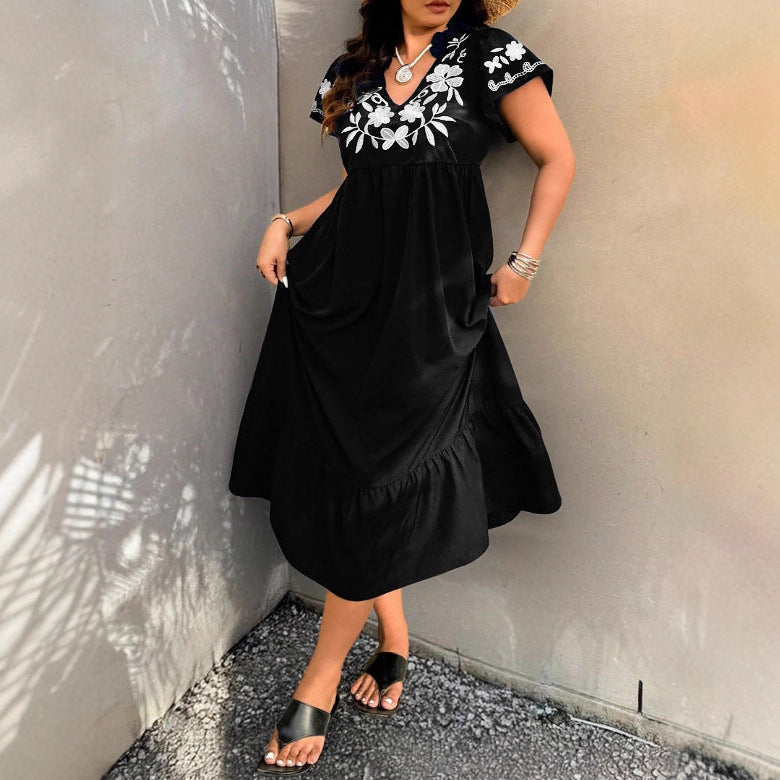 Maxi dress for women with embroidered floral design and voluminous skirt Lune London