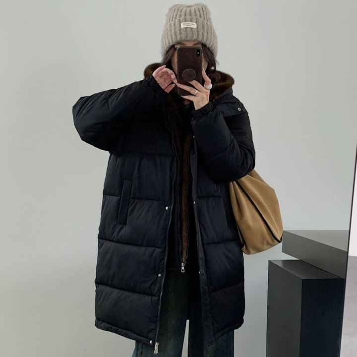 Ladies elegant winter padded parka with faux fur collar and practical pockets Lune London