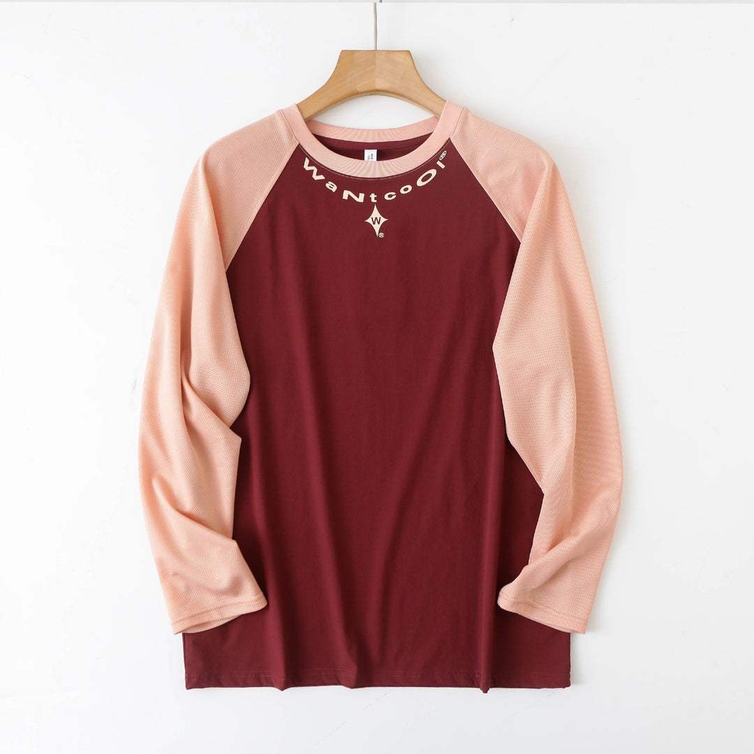 Chemise longue à manches longues sportive pour femmes avec construction innovante de manches raglan Chic & Stil