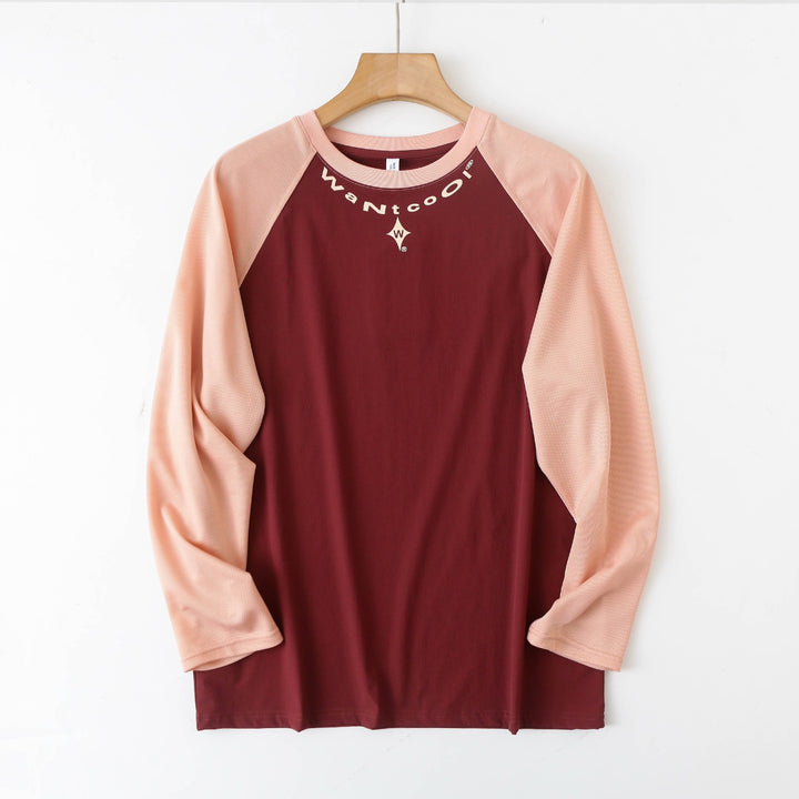 Chemise longue à manches longues sportive pour femmes avec construction innovante de manches raglan Chic & Stil