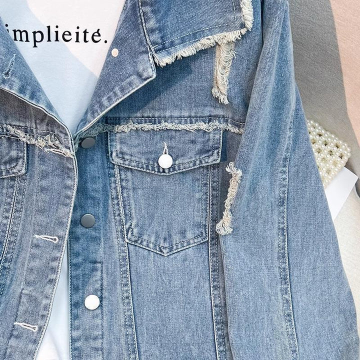 Veste en denim tendance pour femmes avec des détails effilochés Chic & Stil