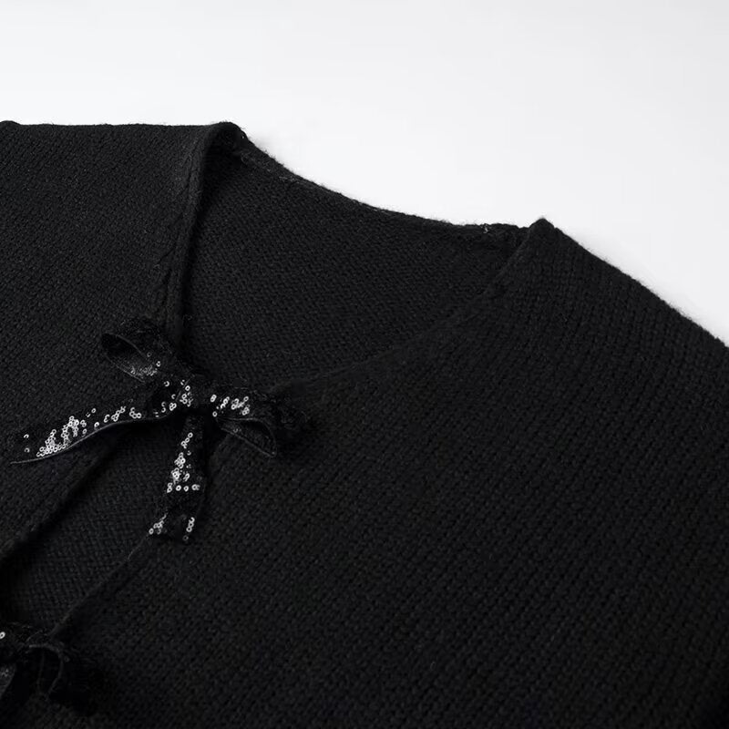 Cardigan en tricot stylé pour femme avec des nœuds glamours sur le bas