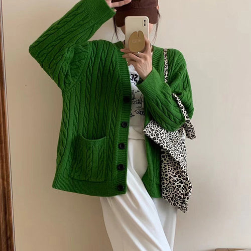 Ladies chunky knit vest with clover pattern and practical pockets Lune London