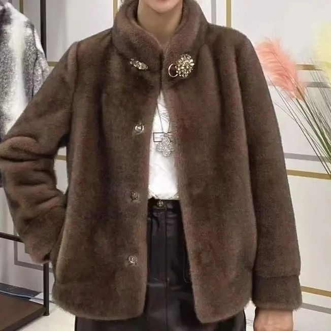 Veste en fleece confortable pour femme avec des détails de boutons élégants Chic & Stil