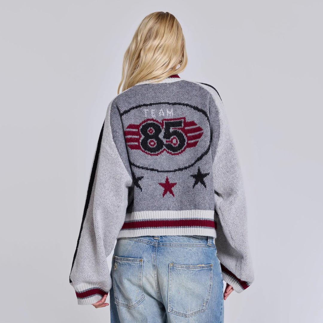 Women's stylish and comfortable knitted sweater with team emblem Chic & Stil